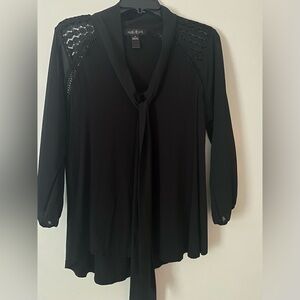Beautiful Back Blouse Size Medium. Great for office or nights out.